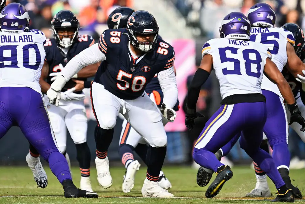 Chicago Bears right tackle looks to block a Minnesota Vikings pass rusher