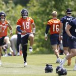 Chicago Bears players run drills during OTAs