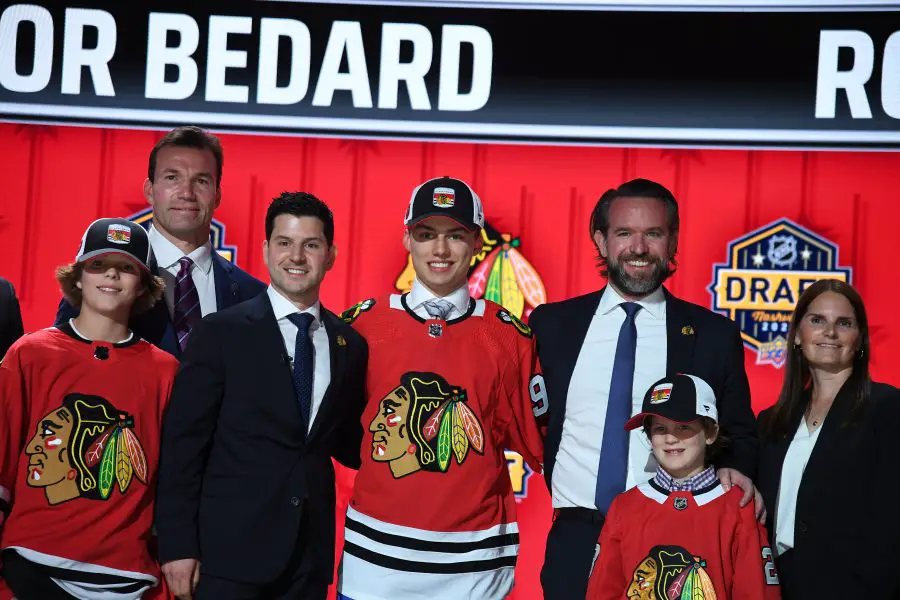  Chicago Blackhawks general manager Kyle Davidson congratulates first overall pick Connor Bedard during the 2023 NHL Draft at Bridgestone Arena. 