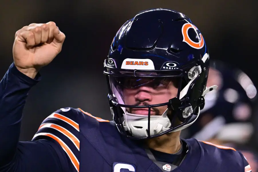 hicago Bears quarterback Caleb Williams (18) warms up before the game against the Seattle Seahawks at Soldier Field.