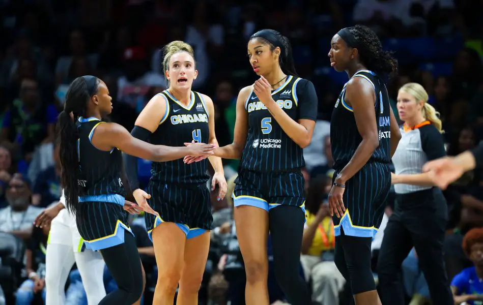 Chicago Sky forward Angel Reese (5) celebrates with Chicago Sky guard Dana Evans 