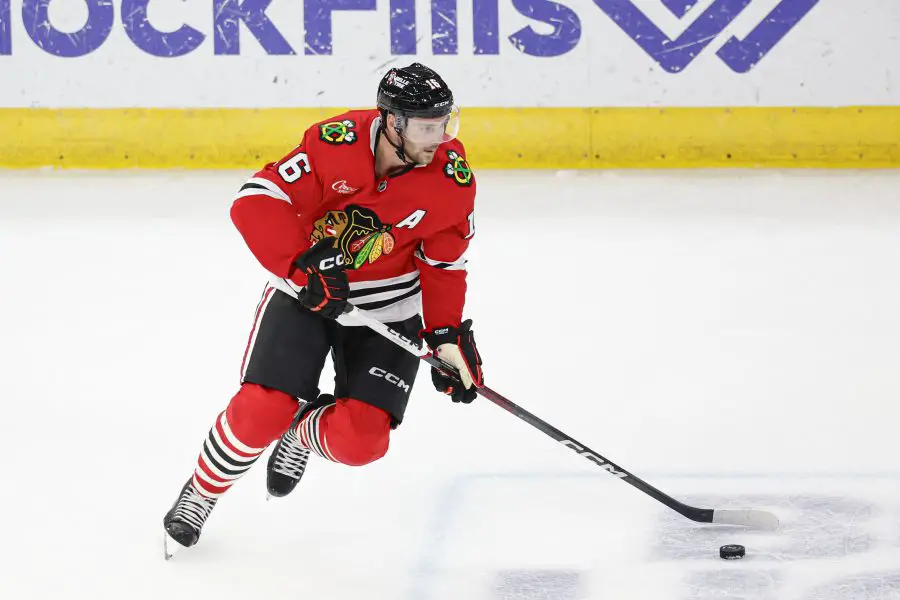 Chicago Blackhawks center Jason Dickinson (16) controls the puck against the Anaheim Ducks during the third period at United Center.