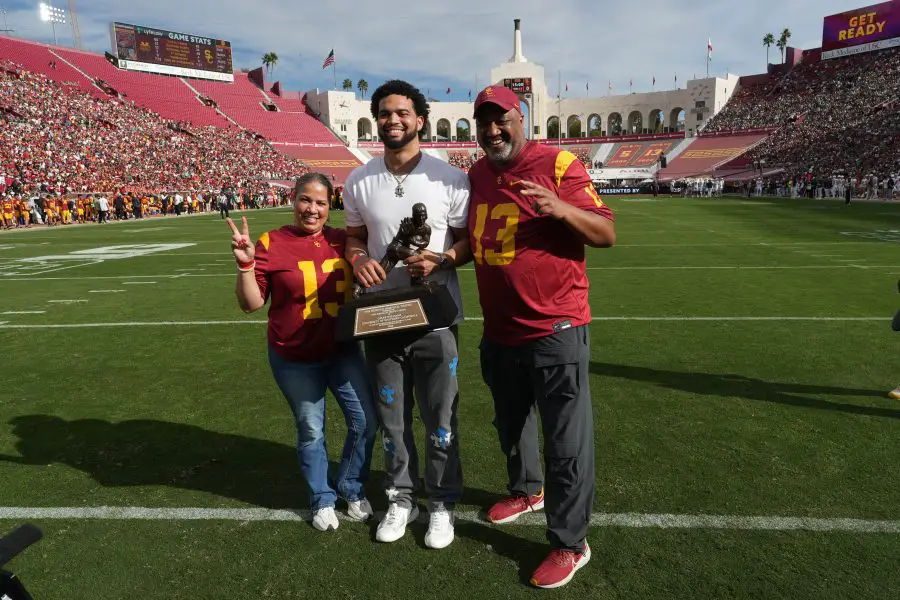 Chicago Bears quarterback Caleb Williams celebrating his Heisman win at USC