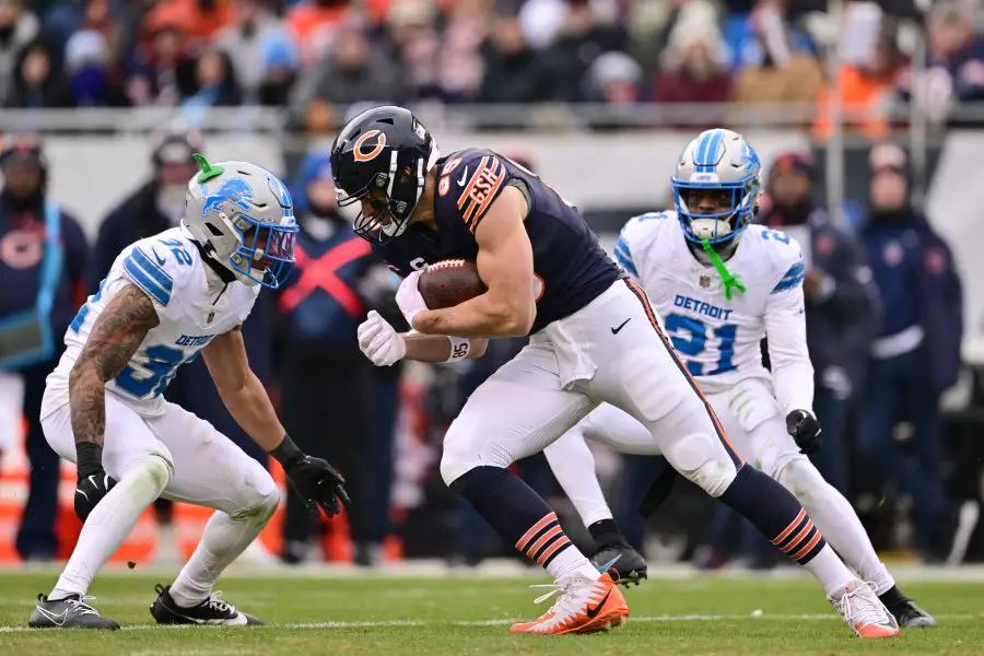 hicago Bears tight end Cole Kmet (85) runs after a catch against the Detroit Lions during the fourth quarter at Soldier Field.