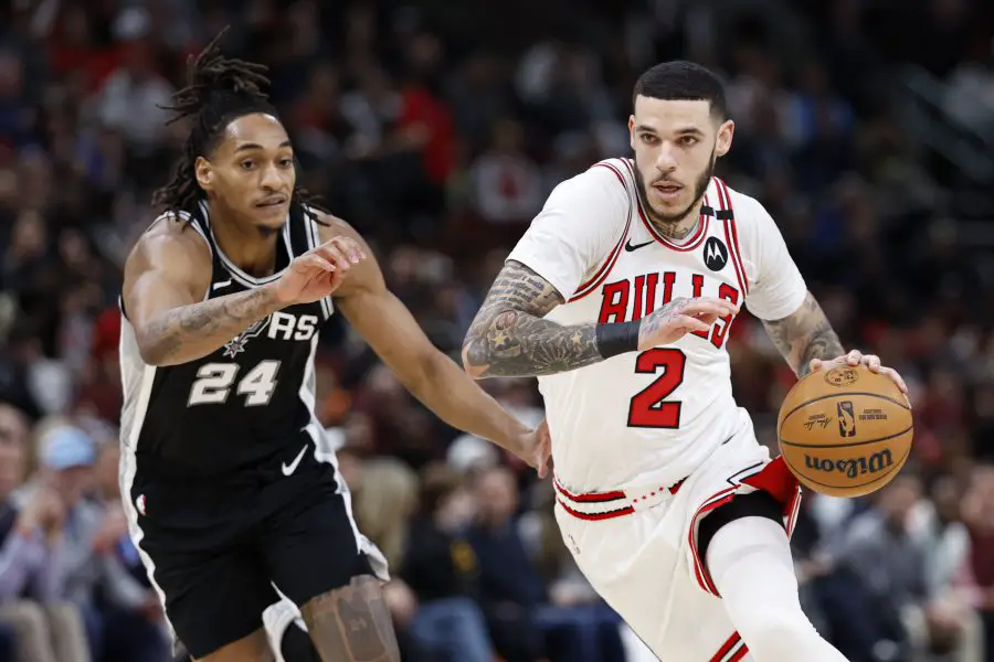 Chicago Bulls guard Lonzo Ball (2) drives to the basket against San Antonio Spurs guard Devin Vassell (24)