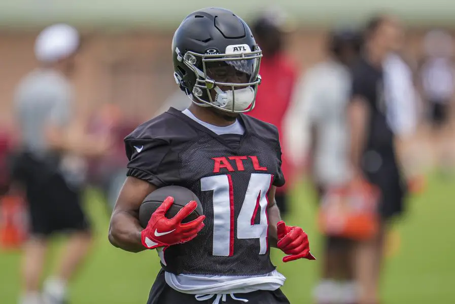 Atlanta Falcons wide receiver Rondale Moore (14) runs with the ball during Falcons OTA at the Falcons Training facility.