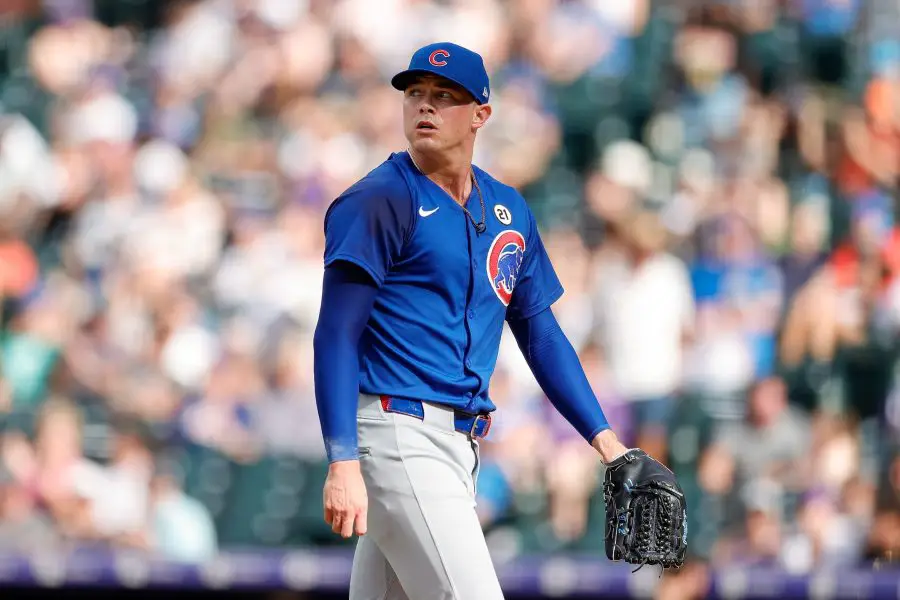 Chicago Cubs relief pitcher Keegan Thompson (71) walks to the dugout at the end of the eighth inning against the Colorado Rockies at Coors Field.