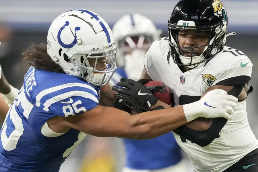 ndianapolis Colts tight end Drew Ogletree (85) brings down Jacksonville Jaguars wide receiver Devin Duvernay (12) during a game against the Jacksonville Jaguars at Lucas Oil Stadium. 