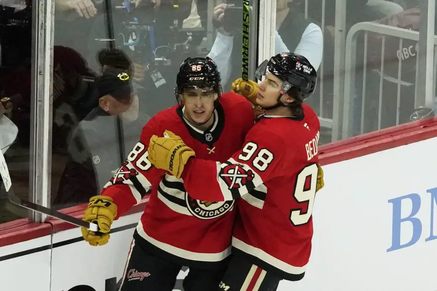 Chicago Blackhawks center Teuvo Teravainen (86) celebrates his goal against the Toronto Maple Leafs with center Connor Bedard (98) during the first period at United Center. 