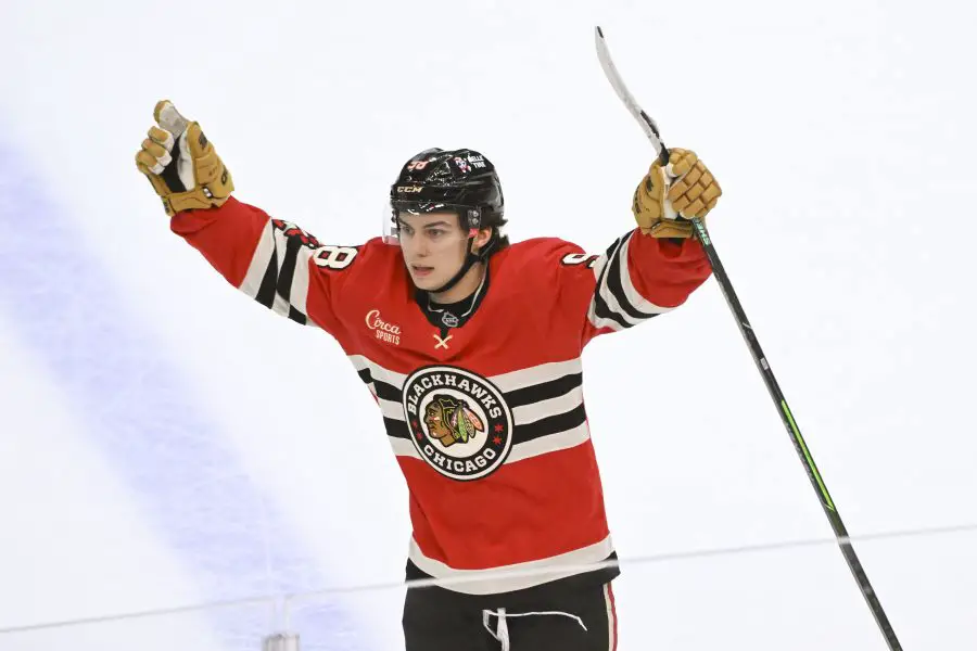 Chicago Blackhawks center Connor Bedard (98) celebrates after scoring the winning goal during the overtime period at the United Center. 