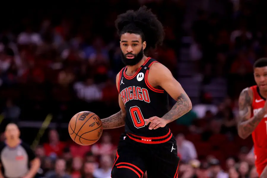 ;Chicago Bulls guard Coby White (0) handles the ball against the Houston Rockets during the first quarter at Toyota Center. 