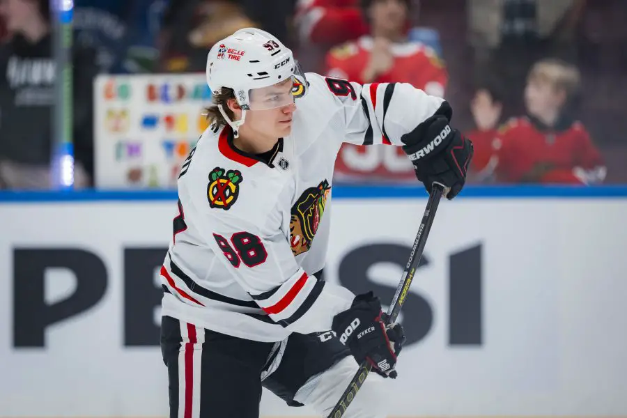 Chicago Blackhawks forward Connor Bedard (98) shoots during warm up prior to a game against the Vancouver Canucks at Rogers Arena.