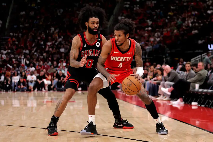 Houston Rockets guard Jalen Green (4) handles the ball against Chicago Bulls guard Coby White