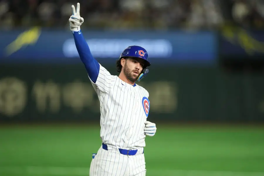 Chicago Cubs shortstop Dansby Swanson (7) reacts after hitting a single against the Los Angeles Dodgers in the second inning during the Tokyo Series at Tokyo Dome.