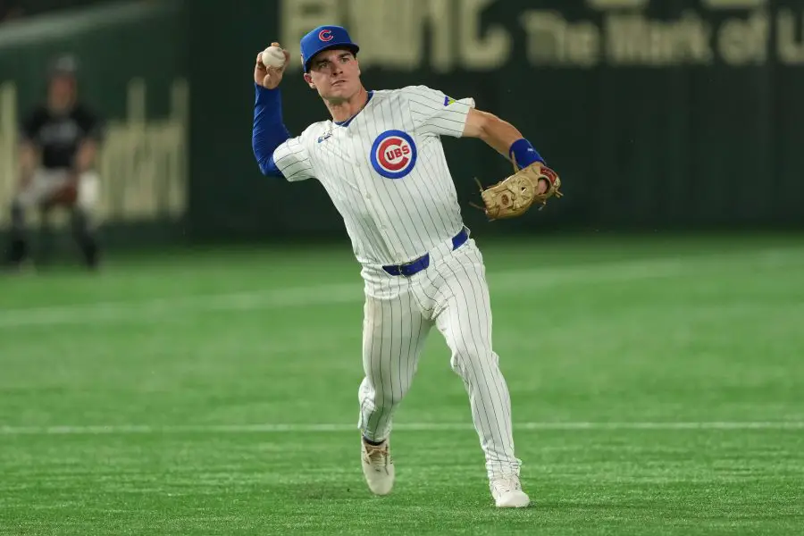 hicago Cubs second baseman Matt Shaw (6) throws the ball to first base in the third inning against the Los Angeles Dodgers during the Tokyo Series at Tokyo Dome.